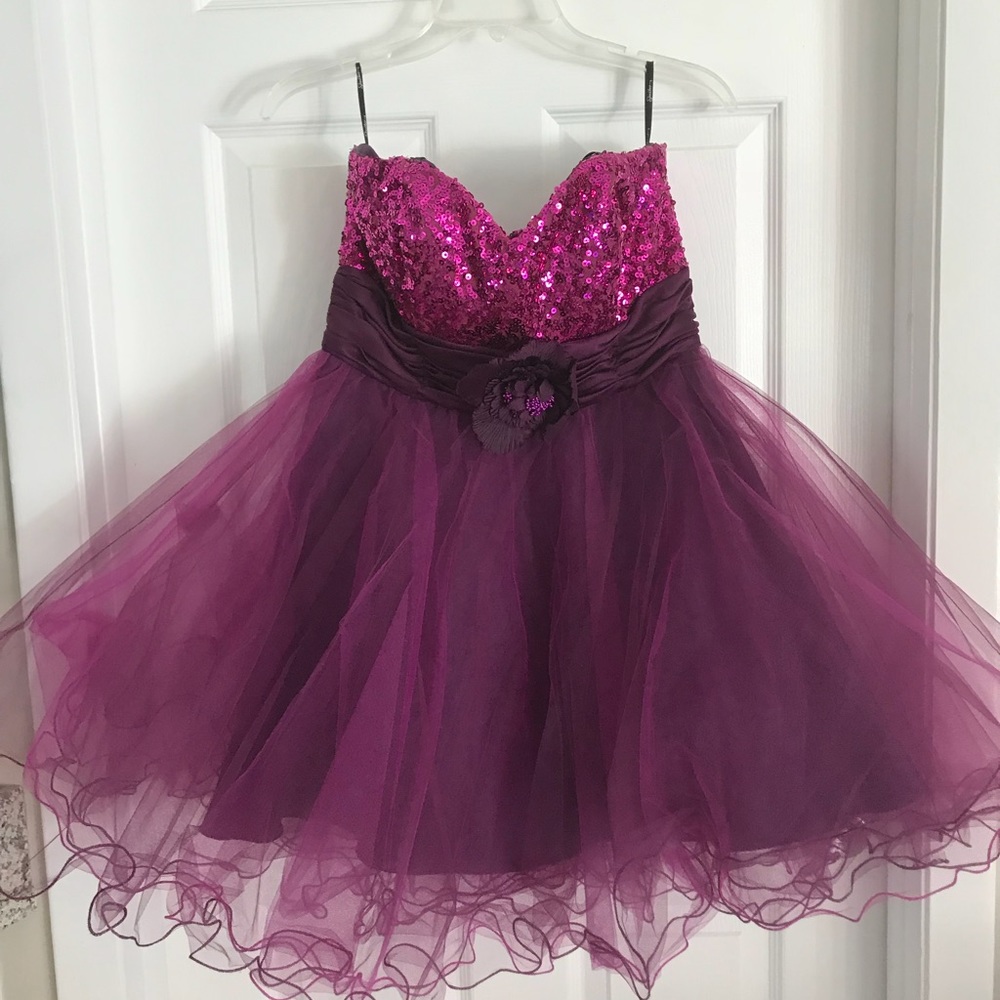 Purple sequined and tulle dress with flower